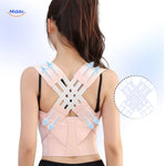 Back support brace product shot on a clean background, showing straps, padding, and overall structure.