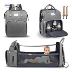 Diaper backpack with foldable bassinet and dedicated bottle compartments.