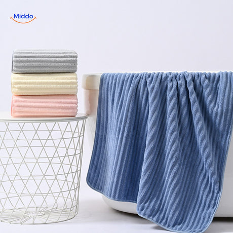 White bath towel with absorbent and quick-dry properties for gifting.