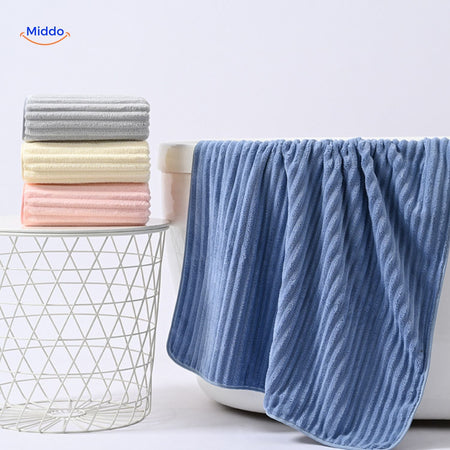 White bath towel with absorbent and quick-dry properties for gifting.