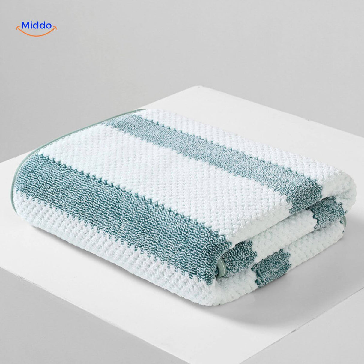 White and blue striped bath towel for modern bathrooms.