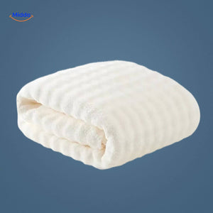 White waffle-textured bath towel with premium quick-dry fabric.