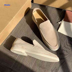 Beige suede Beckwin loafers with cream-colored sole.