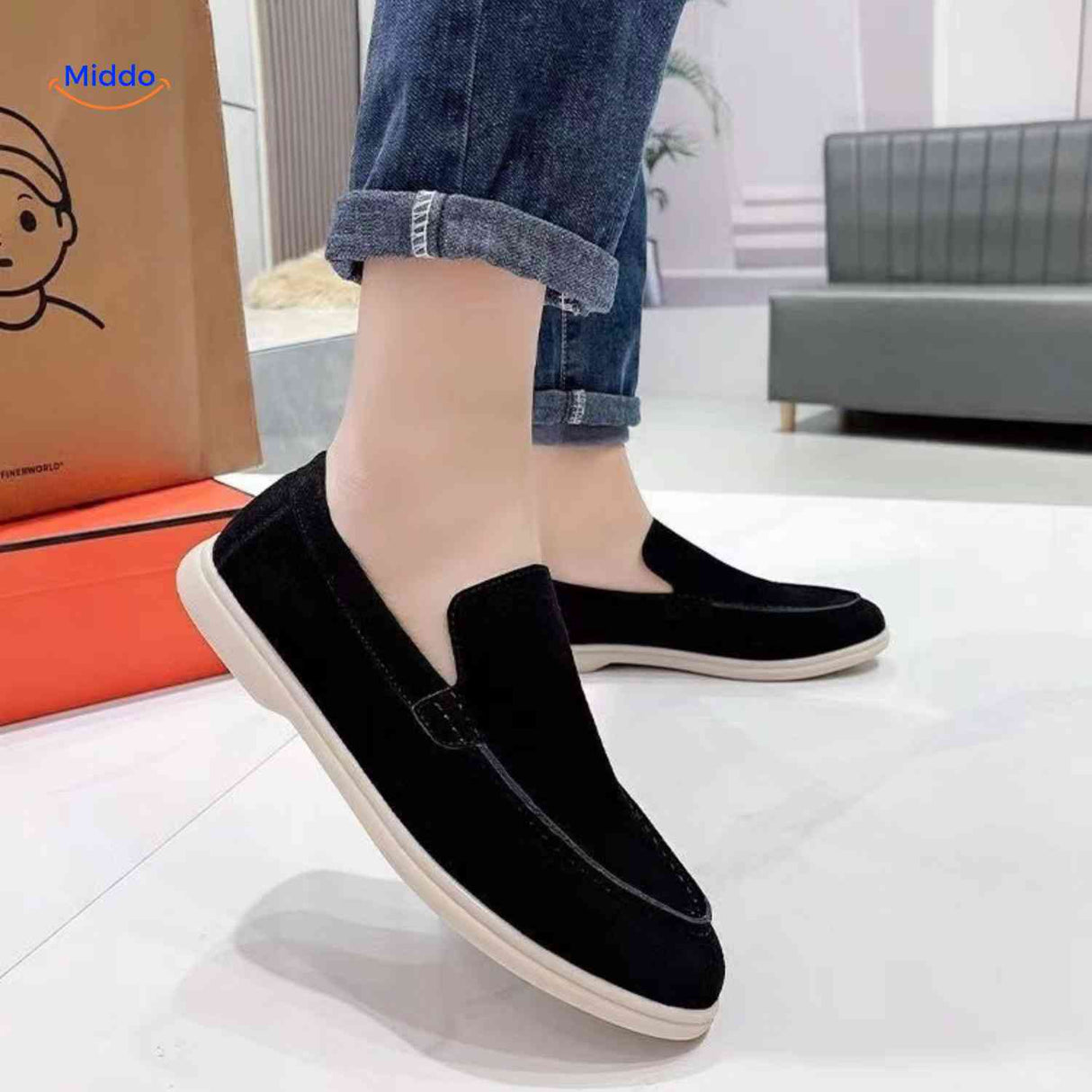 Black suede Beckwin loafers with white sole men's style.