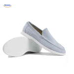 Light blue suede Beckwin loafers with white sole.