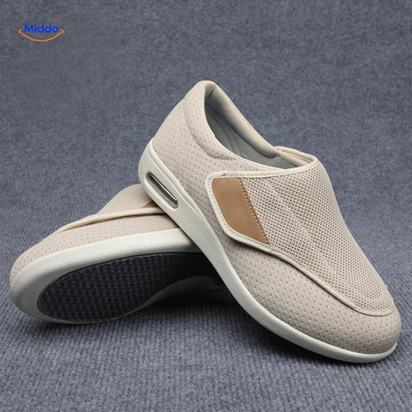 Beige therapeutic shoes with tan trim and cushioned support.