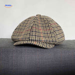 Beige and red plaid wool vintage cap with all-season comfort.