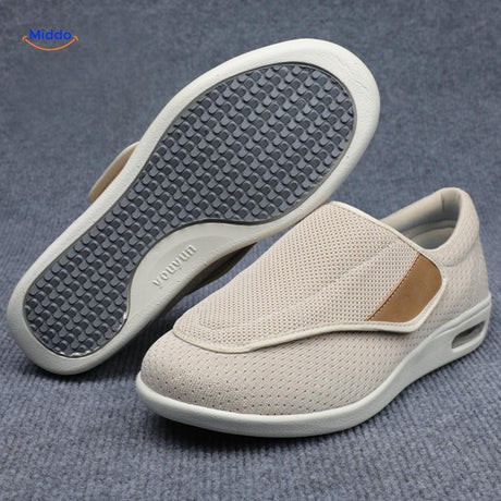Beige shoes with tan accent details and therapeutic support.