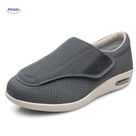 Beige comfort shoes with ventilating fabric for breathable all-day wear.