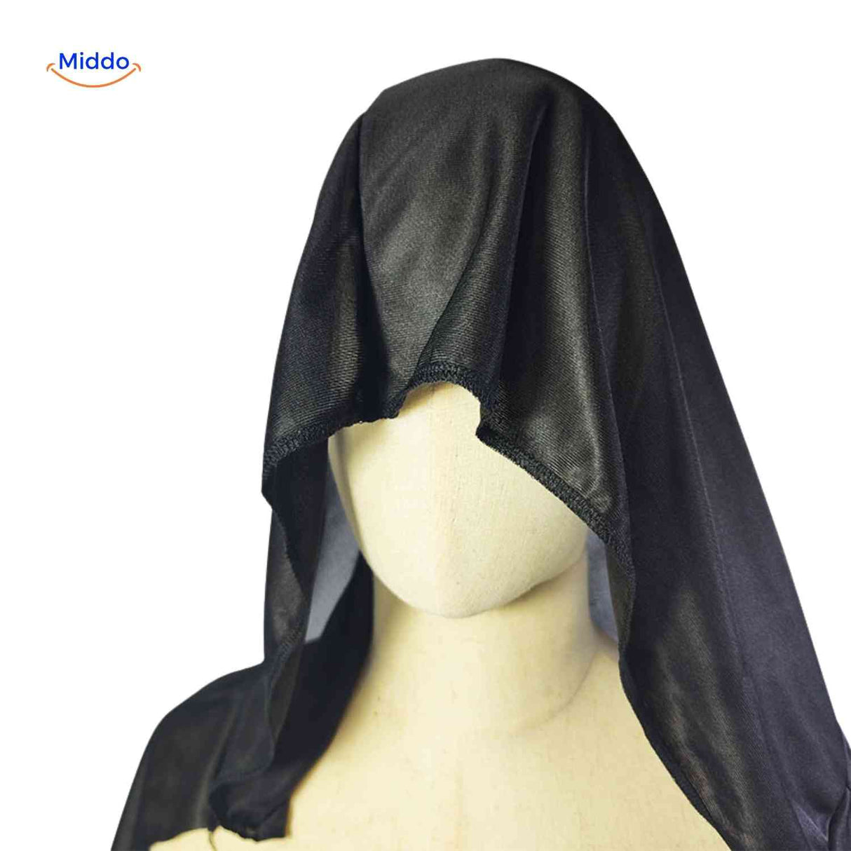 Close-up of black hooded cape material and construction details.