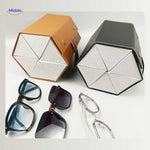 Black and caramel 6-slot eyeglasses cases displayed together holding multiple glasses pairs.