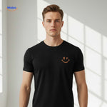 Close-up of smiley print on black breathable cotton t-shirt.