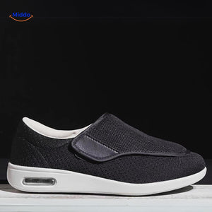 Black support shoes with mesh upper and air-cushion technology sole.