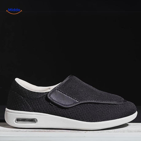 Black support shoes with mesh upper and air-cushion technology sole.