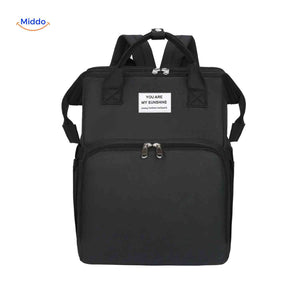 Black modern diaper backpack with sleek design and foldable bassinet feature.