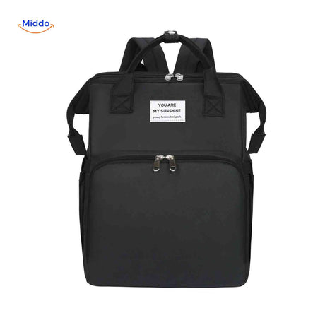 Black modern diaper backpack with sleek design and foldable bassinet feature.