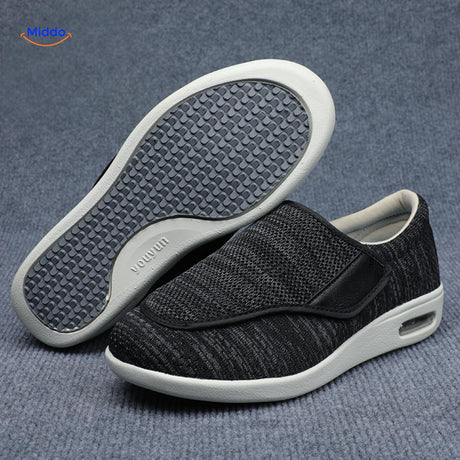 Black support shoes with gray accents and air-cushion sole technology.