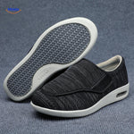 Black support shoes with gray accents and air-cushion sole technology.