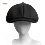 Black solid wool newsboy cap with classic vintage flat cap design.