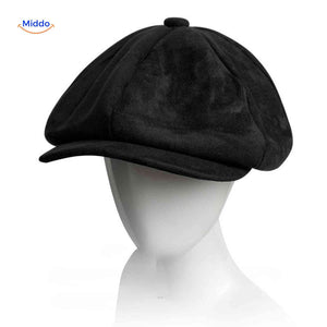 Black suede flat cap combining vintage charm with comfortable wear.