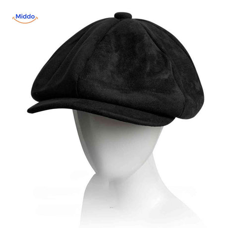 Black suede flat cap combining vintage charm with comfortable wear.