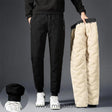 Black waterproof thermo pants with cozy fleece interior lining.