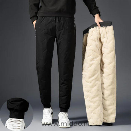 Black waterproof thermo pants with cozy fleece interior lining.