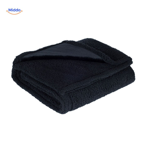 Black waterproof pet blanket with cozy texture and discreet design.