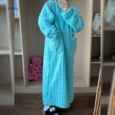 Turquoise blanket robe featuring soft, comfortable fleece.