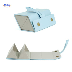 Blue foldable 2-slot eyeglasses case shown closed, highlighting its slim travel-ready profile.