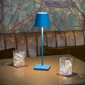 Blue dimmable LED table lamp featuring modern minimalist styling.