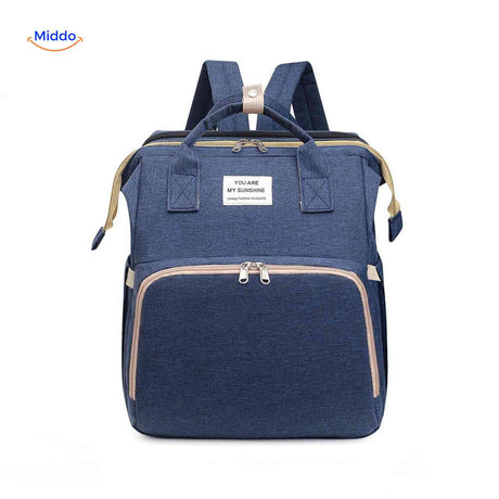 Blue elegant diaper backpack with foldable bassinet and premium features.