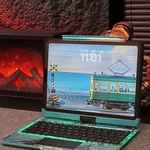 Blue illuminated iPad keyboard case with retro train theme design.