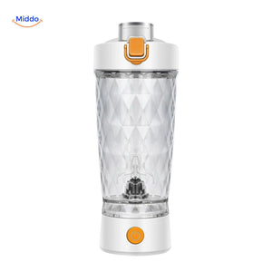 Blue electric shaker with crystal-clear cup body for visibility.