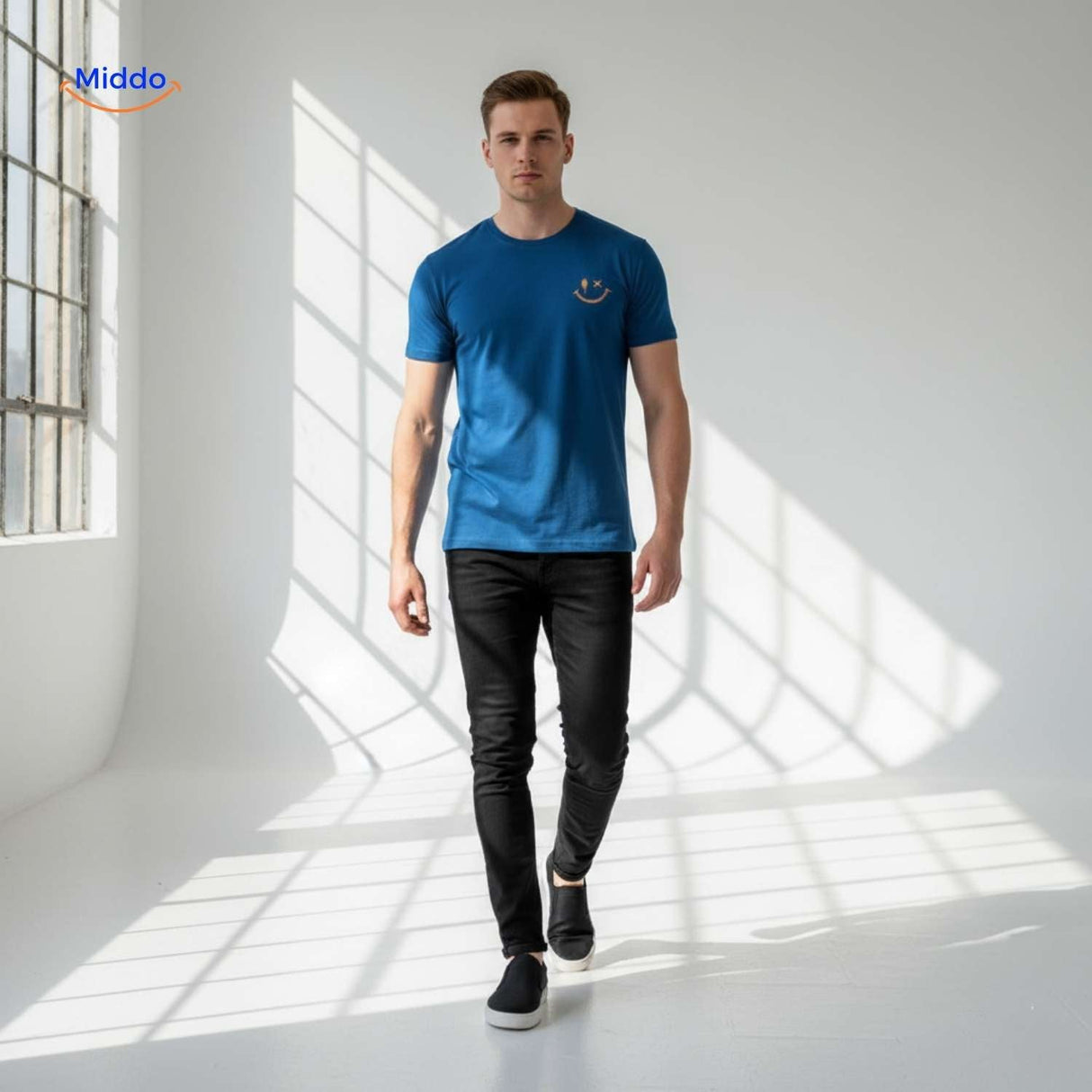 Blue cotton t-shirt with smiley design paired with jeans casual outfit.