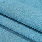 Blue chenille sofa cover close-up, displaying plush texture and water-repellent fabric properties.