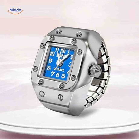 Blue square ring watch with quartz movement and geometric face.