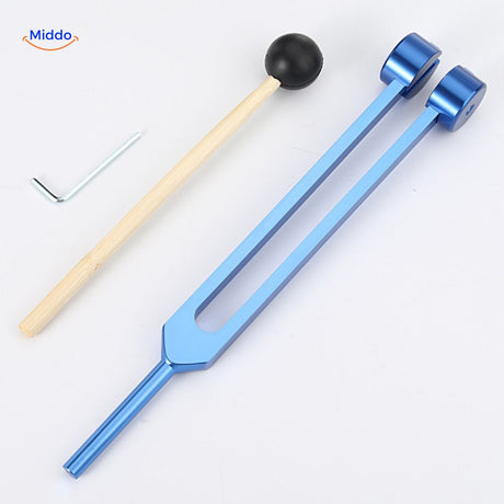 Blue healing tuning fork set with frequency therapy tools included.