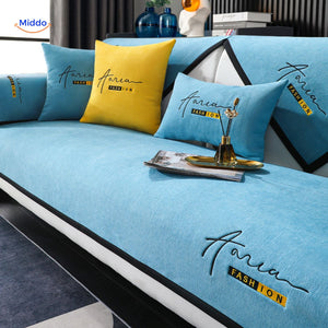 Luxe blue-yellow sofa cover in plush chenille, combining bold colors with premium comfort.