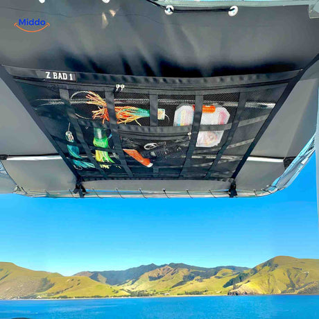 Boat roof storage net designed for fishing gear and supplies organization.