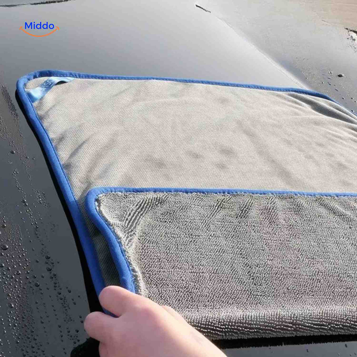 Compact BraidDry microfiber car drying towel with excellent absorption.