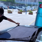 BraidDry car drying towel in action demonstrating fast water absorption.