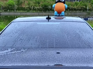 Fast-drying process showing BraidDry microfiber towel efficiently removing water.