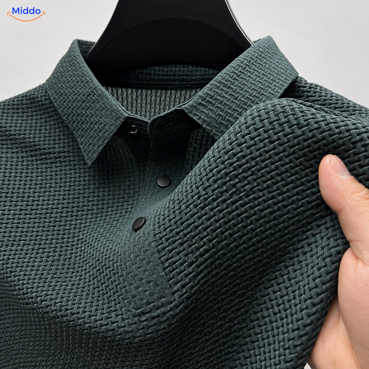 Close-up of the BreezeWear polo fabric texture
