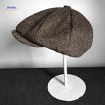 Brown herringbone wool flat cap with heritage vintage design.