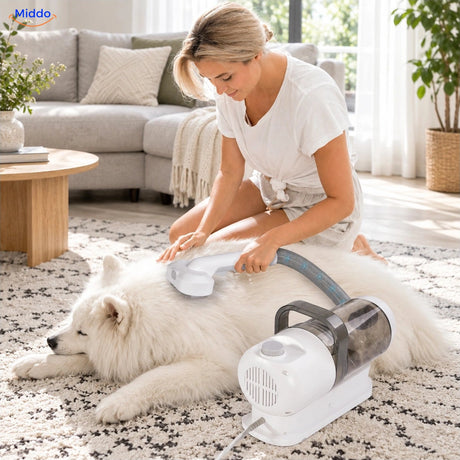 Brushing a dog with the Furiva grooming vacuum