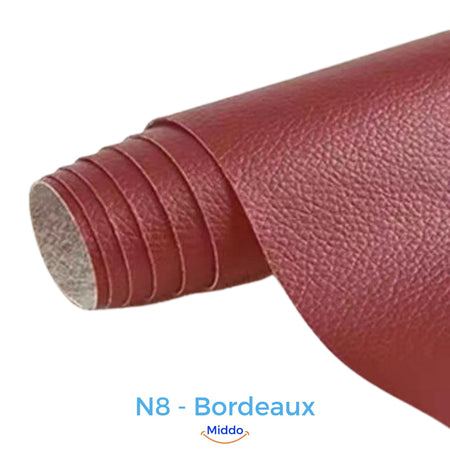 Burgundy leather repair patch perfect for deep red furniture damage restoration.