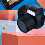 Close-up detail of portable camera lens and built-in flash