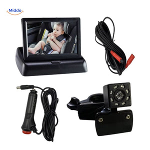 Baby monitor display with infrared camera, cables, and complete installation kit.