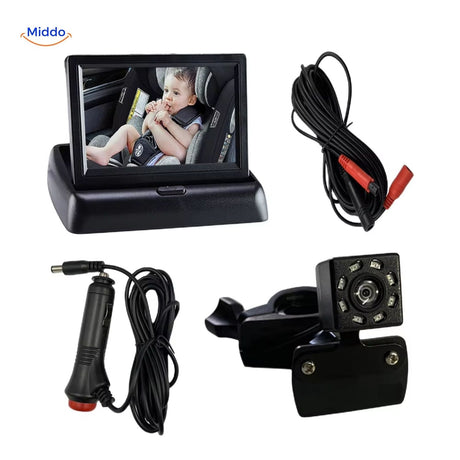 Baby monitor display with infrared camera, cables, and complete installation kit.